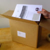putting giraffe integrated label into box